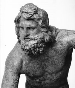 Head of Poseidon, from a bronze statuette at the National Archaeological Museum.