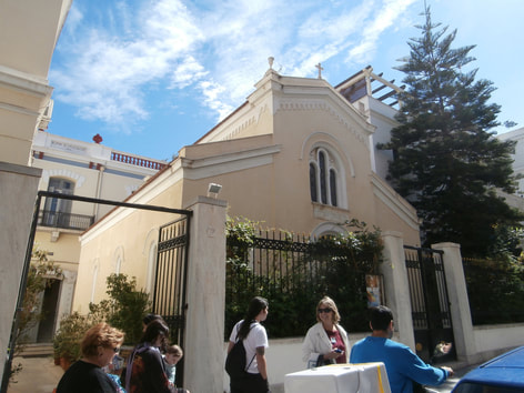 The church of Agios Andreas within the courtyard of the Athens Archdiocese.