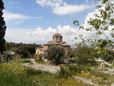 A Spring-time photo of the church of Agioi Apostoloi, within the site of the ancient Agora in Athens.