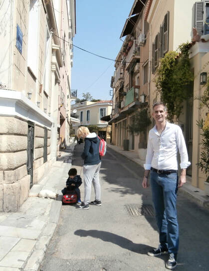 The Mayor of Athens, Mr. Kostas Bakoyannis, along with his wife and young son in an impromptu encounter on Tripodon Street, Plaka, on Sunday the 12th of April.