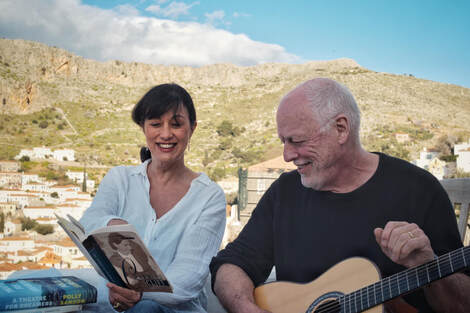 Author Polly Samson with husband David Gilmour of Pink Floyd at Hydra, working on their set list for the book 