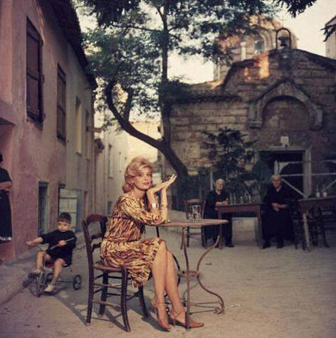 Actress Melina Merkouri, posing in front of Agios Ioannis Theologos church in a 1960 photograph.
