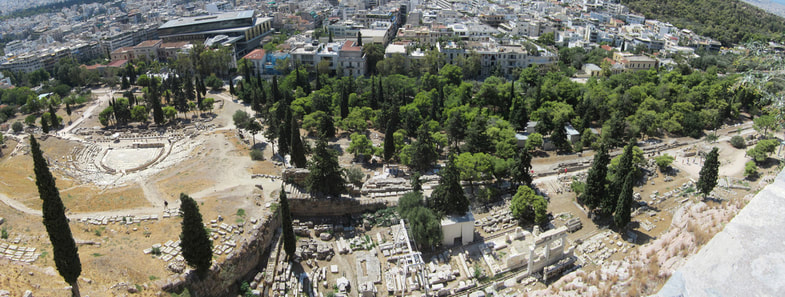 The site of the Theater of Dionysos (left) and Asclepieion (right), south slope of the Acropolis, Athens. At the far left, the Acropolis Museum.