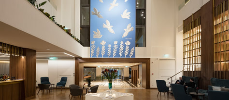 The Atrium lounge of the Electra Metropolis Hotel in Athens. Centerpiece painting by Alecos Fassianos.